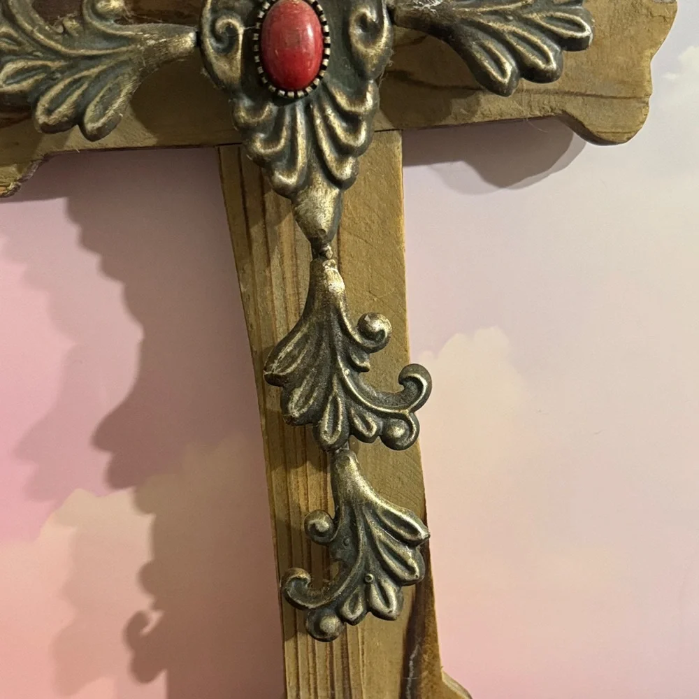 Rustic Wooden Cross with Golden Accents and Red Gem